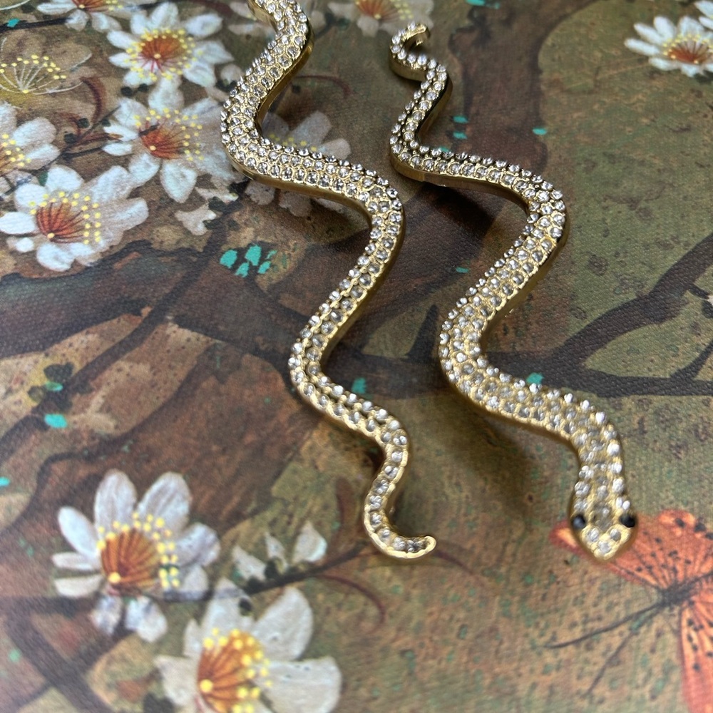 Gold Serpentine Earrings with Textured Design